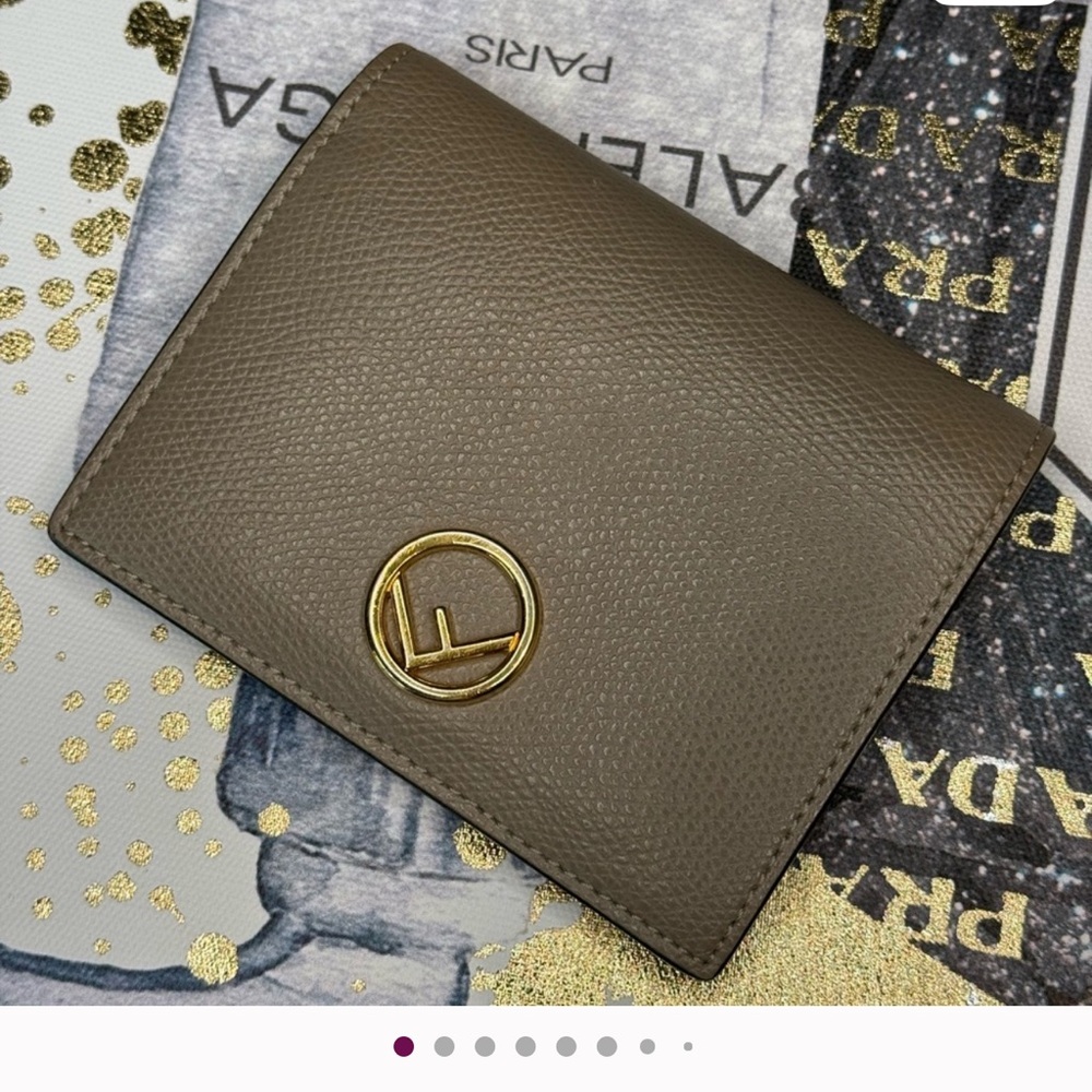Fendi F Beige Leather Bi-Fold Wallet with Gold Logo. 31/2 X 41/2